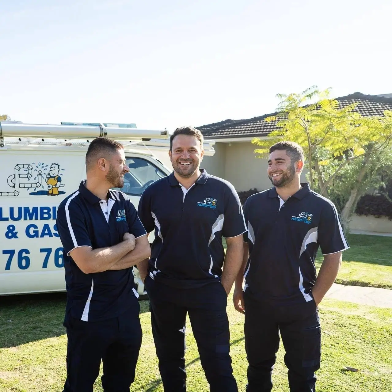 The Pacer Plumbing & Gas team in front of a Pacer van